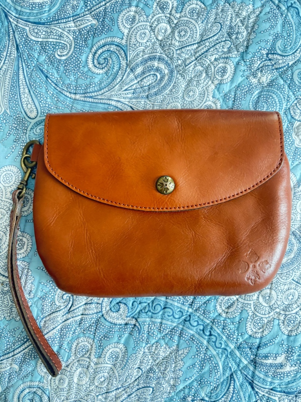 PATRICIA NASH COGNAC LEATHER WRISTLET